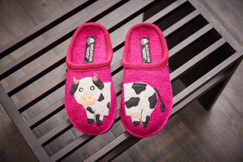 Pink boiled wool slipper by Haflinger with cow motif