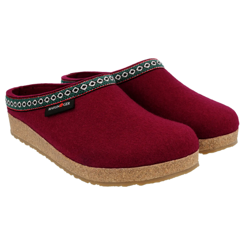 Grizzly GZ - Bordo-colored wool felt house slipper, shown from the side, featuring white, green, and red webbing trim around the upper edge.