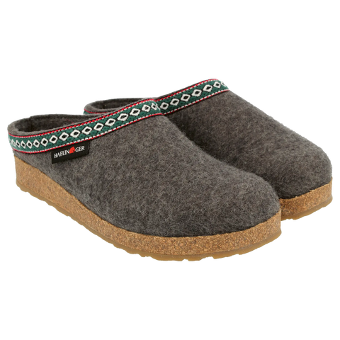Grizzly GZ - Graphite-colored wool felt house slipper, shown from the side, featuring white, green, and red webbing trim around the upper edge.