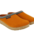 Grizzly GZ - Pumpkin-colored wool felt house slipper, shown from the side, featuring white, green, and red webbing trim around the upper edge.